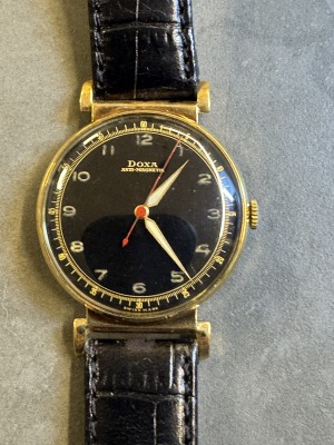DOXA - Manual, rare gold case and black dail,40th,gold…..