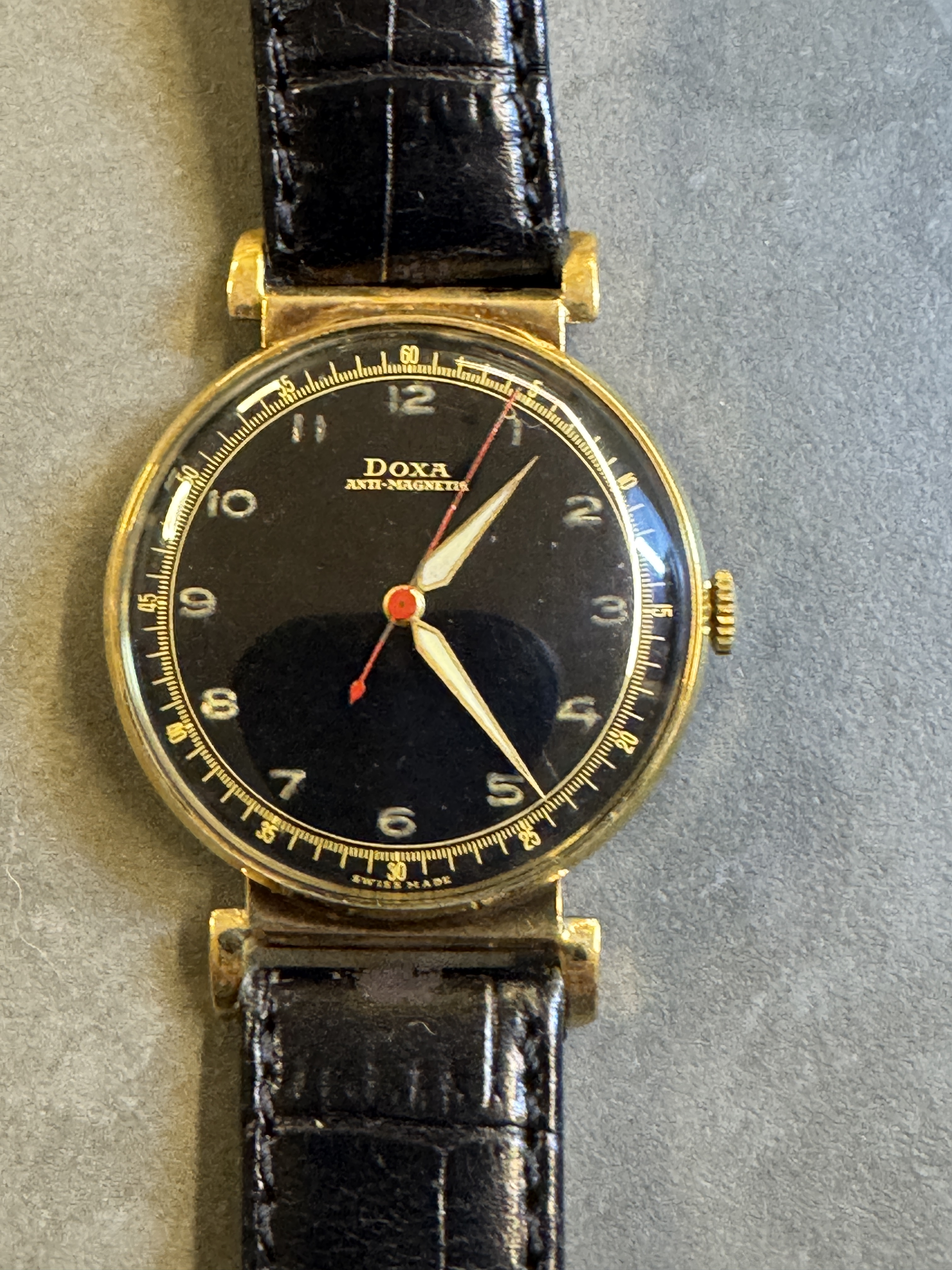 DOXA - Manual, rare gold case and black dail,40th,gold…..