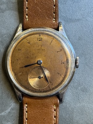 OMEGA - Manual rare bronze color dail,34mm,50th